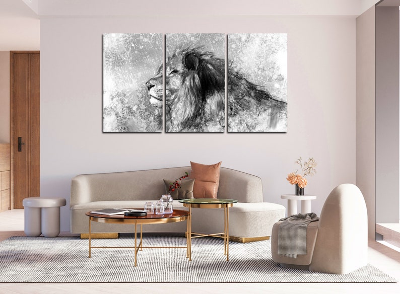 May include: A black and white canvas print of a lion's head with a textured background. The print is divided into three panels.