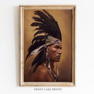 May include: A framed portrait of a Native American man in profile, wearing a traditional feathered headdress. The artwork features a warm color palette with a gold-toned background and the text "SWEET LAKE PRINTS" at the bottom.