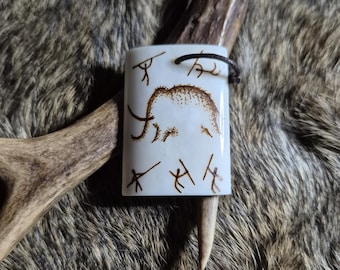 Mammoth hunt talisman, bone pyrography, stone age paleolithic paleolithic cave painting art caveman hunter prehistory archaeology necklace