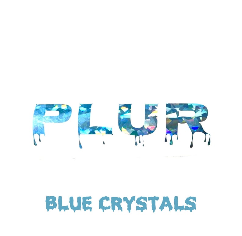 May include: A blue iridescent sticker with the word "PLUR" in dripping letters. The text "BLUE CRYSTALS" is below the word "PLUR".