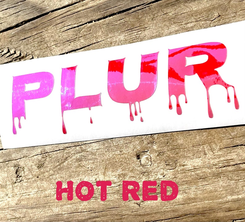 May include: A white sticker with the word "PLUR" in dripping pink and red letters. The text "HOT RED" is printed below the word "PLUR".