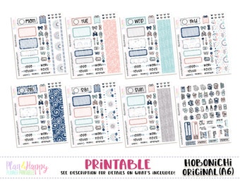 May include: Printable stickers designed for a Hobonichi Original A6 planner. The stickers feature a blue and white swirl pattern, pink and blue accents, and various icons including a sun, moon, stars, and hearts. The stickers are labelled with the days of the week: Monday, Tuesday, Wednesday, Thursday, Friday, Saturday, and Sunday.