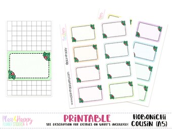 May include: Printable planner stickers featuring rectangular boxes with holly corner accents. The boxes have a dashed border and are in various pastel colors. The text "PRINTABLE" and "HOBONICHI COUSIN (A5)" are also visible.