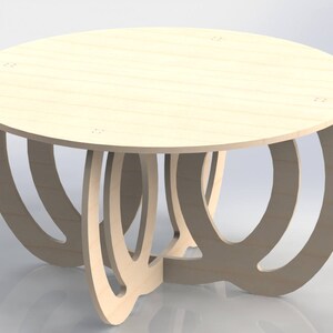 May include: A light-colored, round coffee table with a unique design. The tabletop is a light wood color, supported by curved, interlocking legs. The table is approximately 30 inches in diameter.