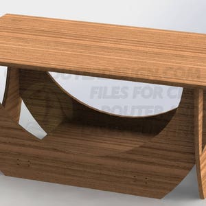 Pu&ograve; includere: Un tavolino da caff&egrave; in legno con piano rettangolare e lati curvi. Il tavolo &egrave; realizzato in legno marrone chiaro e presenta un design unico con forme ritagliate sui lati. Adatto per un soggiorno.