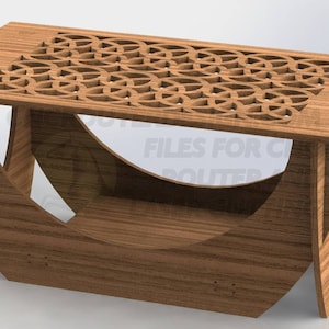 Pu&ograve; includere: Un tavolino da caff&egrave; in legno con un design traforato decorativo sul piano. Il tavolo ha un piano rettangolare e gambe curve ed &egrave; realizzato in legno marrone chiaro. Le dimensioni del tavolo sono di circa 102 cm di lunghezza, 51 cm di larghezza e 46 cm di altezza.