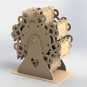 May include: A wooden Ferris wheel photo display. The display has a heart-shaped cutout on the base and a decorative frame around each photo slot. The word "PHOTO" is visible on each frame. The wheel is made of light brown wood.