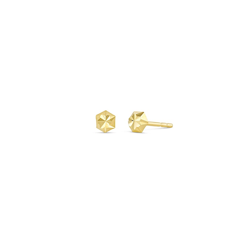 May include: A pair of gold-toned geometric stud earrings. Each earring features a faceted hexagonal shape.