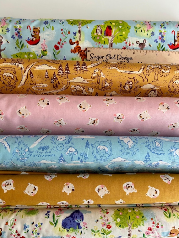 Half Yard Bundle of Winnie the Pooh 100 Aker Woods fabric by Jill Haworth for Riley Blake Designs.