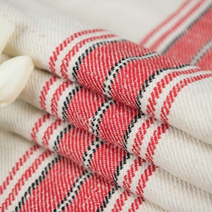 Sunbrella fabric outdoor pillows / Antique red stripes