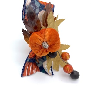 Navy Blue and Brown Thanksgiving and Fall Napkin Rings with Pine Cone center, Burlap Twine Bow with orange fall branches