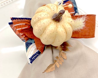 Thanksgiving Fall Farmhouse Napkin Rings decorated with Rustic Beige Pumpkin and Navy Blue Burlap Bow with Feathers, Copper Branches Decor