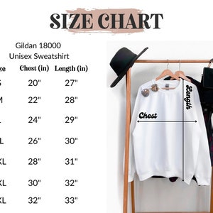 K&ouml;nnte beinhalten: Gr&ouml;&szlig;entabelle f&uuml;r ein Gildan 18000 Unisex-Sweatshirt. Die Tabelle zeigt Brust- und L&auml;ngenma&szlig;e in Zoll f&uuml;r die Gr&ouml;&szlig;en S bis 4XL.