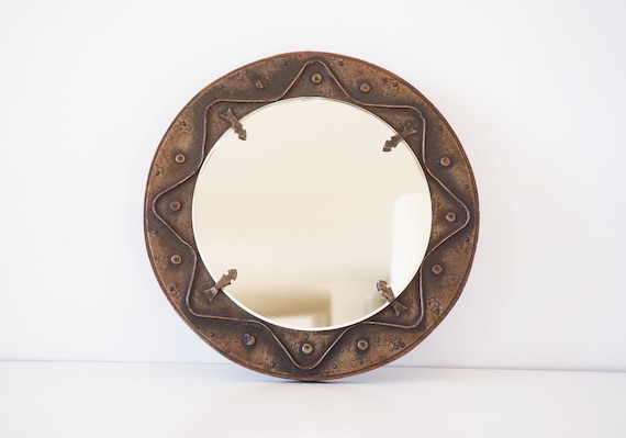 Vintage decorative mirror in wood and gold metal