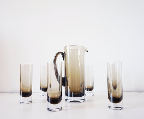 Set of 6 glasses and their gray smoked glass carafe 1970