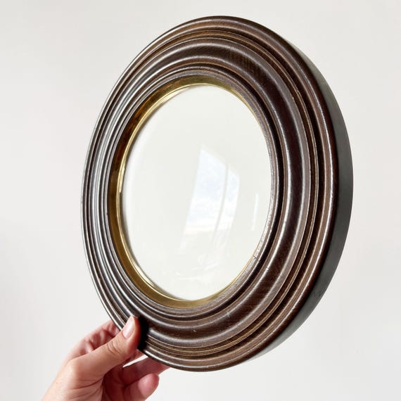 Antique round wooden frame and convex glass, circa 1900