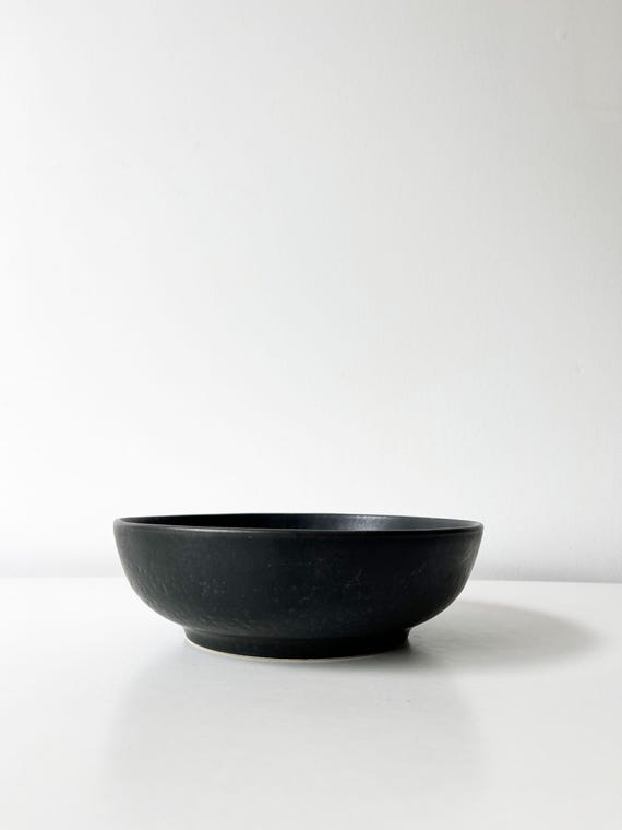 Vintage round black ceramic trinket tray