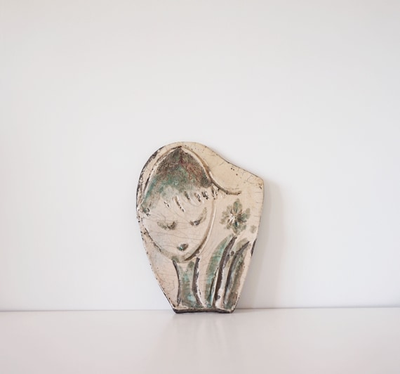 Glazed stoneware plaque with face
