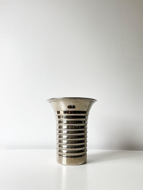 Vintage modernist ribbed polished aluminum vase
