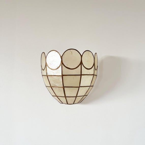 Vintage mother-of-pearl wall sconce in the shape of a seashell