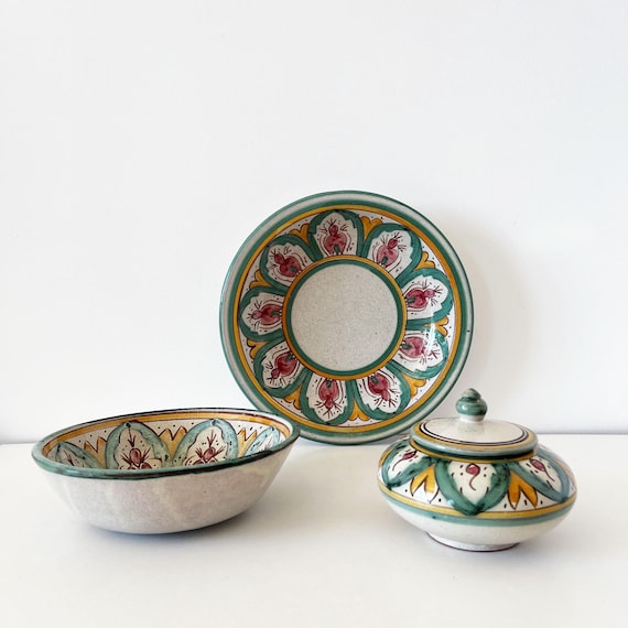 Set of hand-painted decorative ceramic dishes