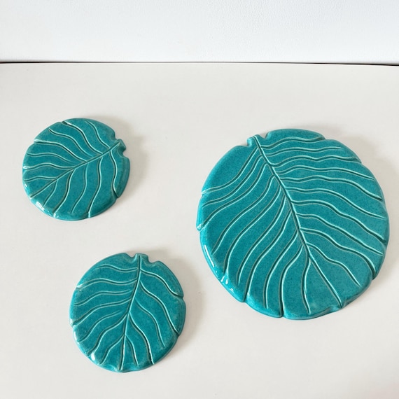 1950s ceramic trivet and bottle coaster
