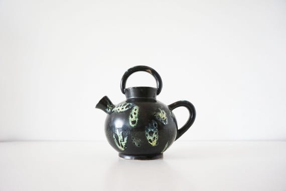 Enameled ceramic jug 1960