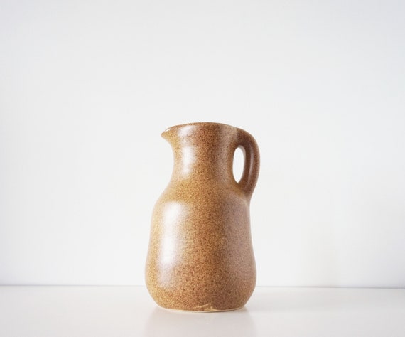 Pitcher or carafe in old sandstone