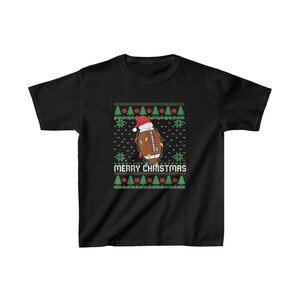 クリスマス フットボール キッズ シャツ。お祭りフットボール シャツ。クリスマス パーティー シャツ。学校パーティー シャツ。キッズ フットボール シャツ。