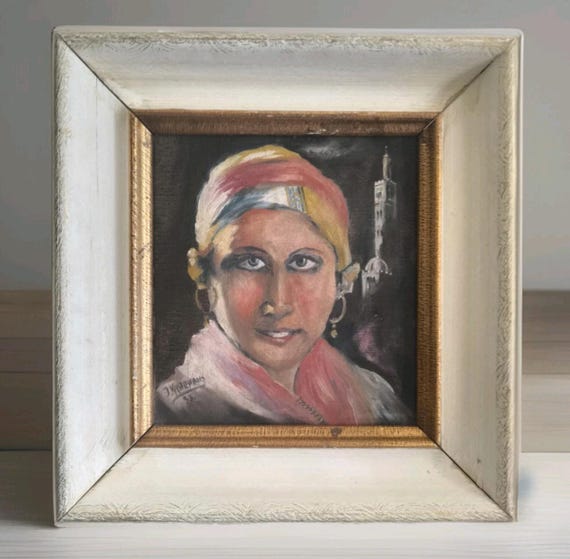 J KASTENHOLZ Oil on canvas "Portrait of an orientalist woman with a minaret" framed dated 1933