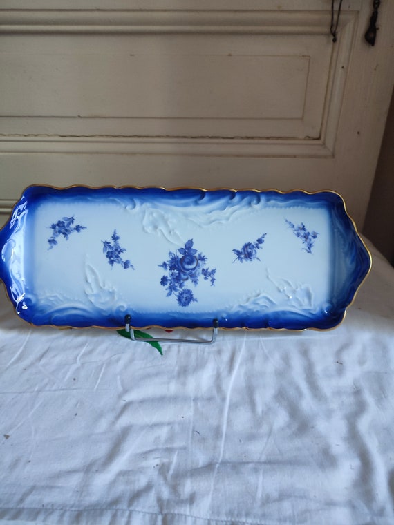 Tharaud Limoges porcelain cake dish in blue ovenproof glass with flowers including roses