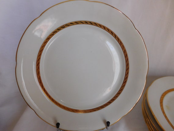 Five flat plates french porcelain gold fillets Larcheveque UML Vierzon