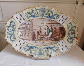 Géo MARTEL (1872-1942) oval dish with Desvres earthenware, genre scene and satyrs