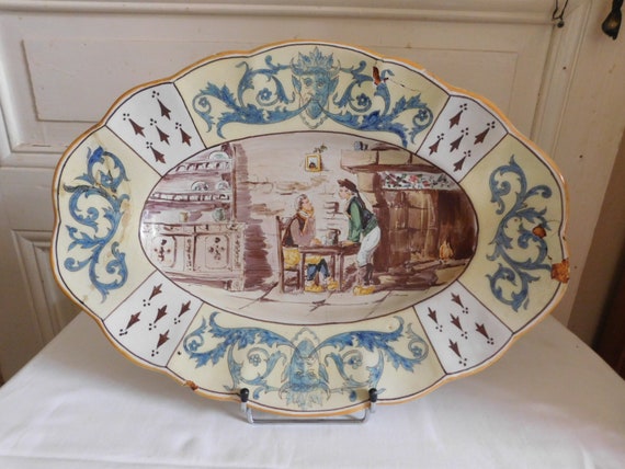Géo MARTEL (1872-1942) oval earthenware dish from Desvres genre scene and satyrs