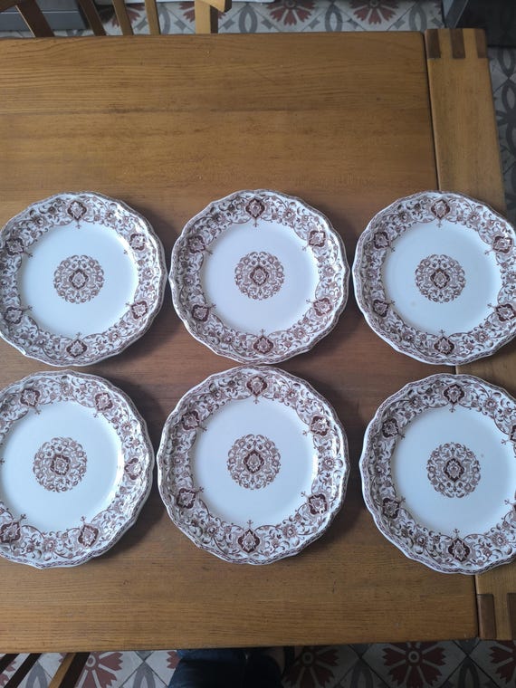 Gien earthenware, beautiful set of six flat plates with brown decoration of scrolls and floral lambrequins, French earthenware number 2