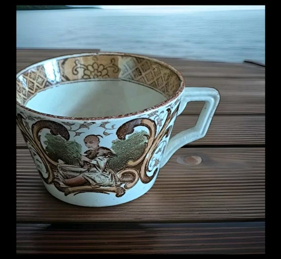 Sarreguemines tasse en faïence au Chinois jouant de la guitare 1875/1899 numéro trois