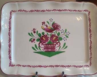 Rectangular serving dish in St Clément earthenware, Chanteclerc model, decorated with a rooster and a flower basket