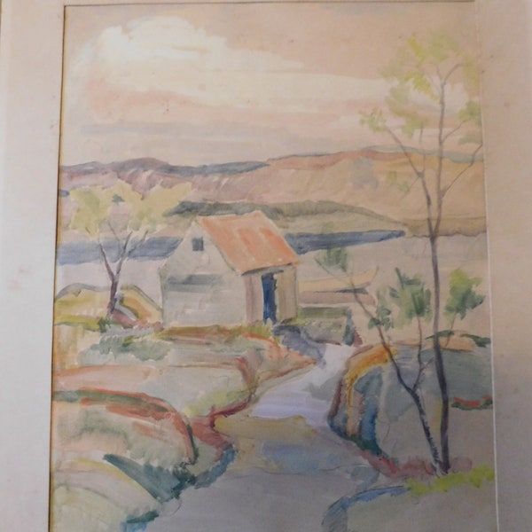 A. KRISTIANSEN (XXème) "Paysage lacustre maison barque collines " aquarelle datée 1946 encadrée sous verre