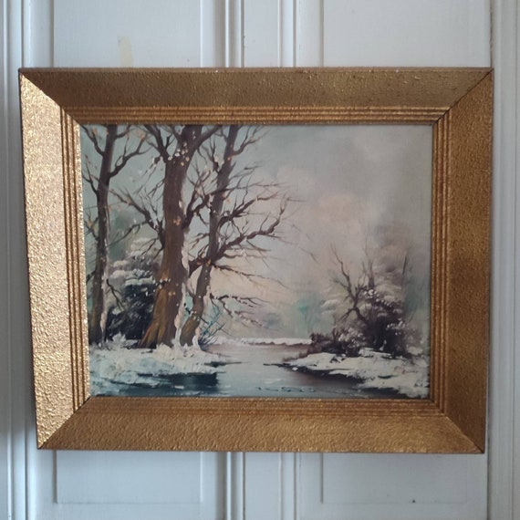Oil on canvas signed "Winter landscape under wood snowy riverside"