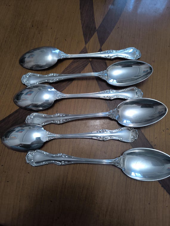 Mappin & Web six silver-plated metal soup spoons with vegetal scroll decoration
