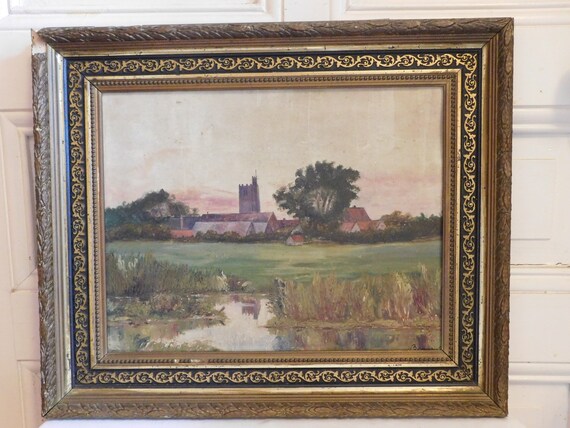 Oil on canvas signed "View of village medieval tower and river" stuccoed frame French school
