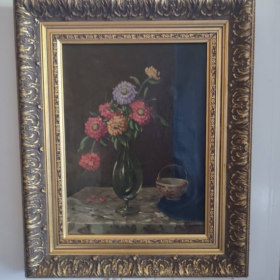 Still life with a bouquet of flowers with a drapery cut vase signed oil on canvas, gilded stucco frame, French school