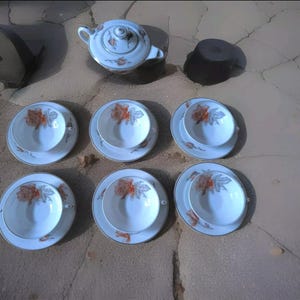 André Giraud & Cie part of a tea service of six cups and saucers in Limoges porcelain French porcelain