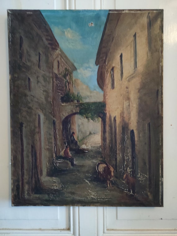 DINO SILVESTRE oil on canvas "Old alley bustling with two seated men and goats"