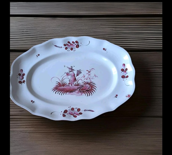 Rare oval earthenware dish from St Clément, pink Chinese model, French earthenware