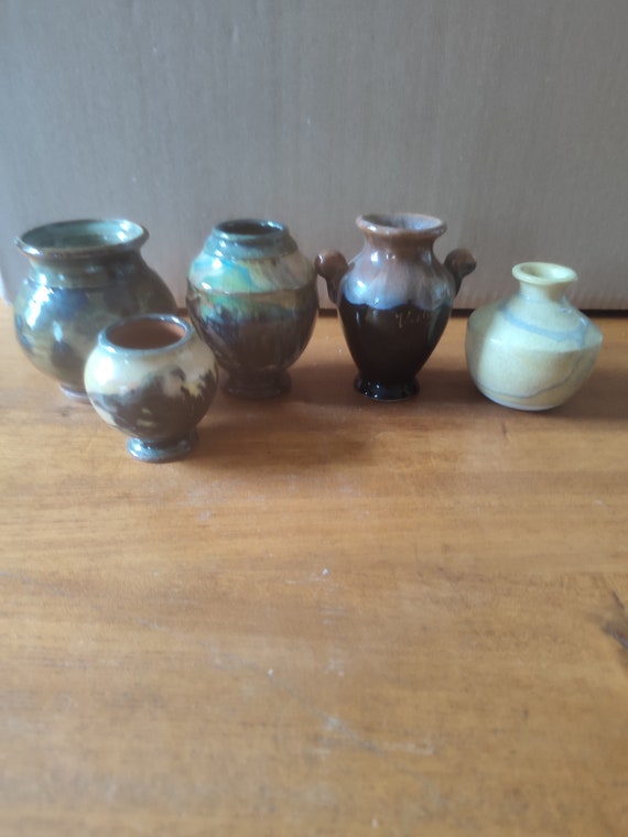 Suite of five miniature vases in glazed terracotta and earthenware