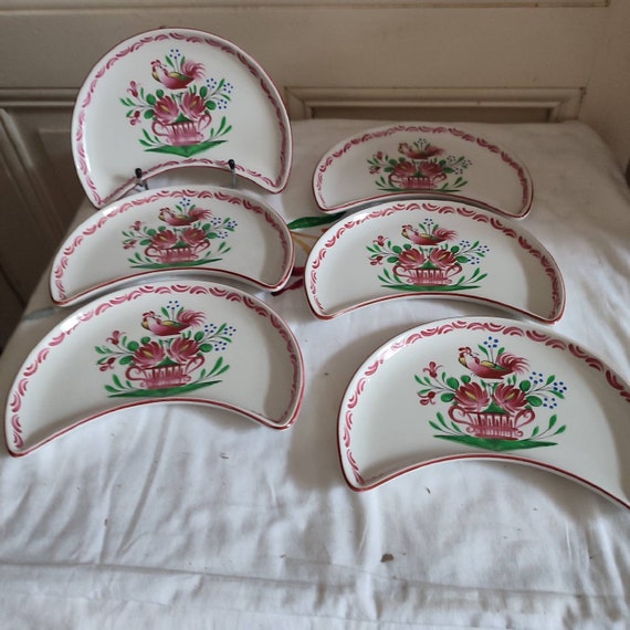 Suite of six half-moon earthenware plates Lunéville St Clément model Chanteclerc decorated with flowered basket and rooster number 2
