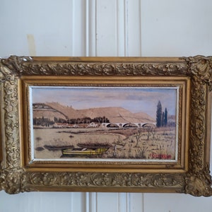 P. KNEPPERT (XXème) technique mixte sur carton "Paysage de vigne pont village" cadre bois stuqué doré école française