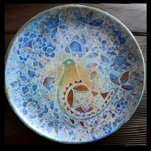 Bernard BUFFAT (20th century) large round ceramic dish decorated with hen and flowers