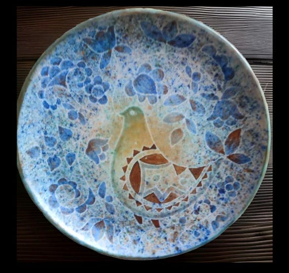 Bernard BUFFAT (20th century) large round ceramic dish decorated with hen and flowers